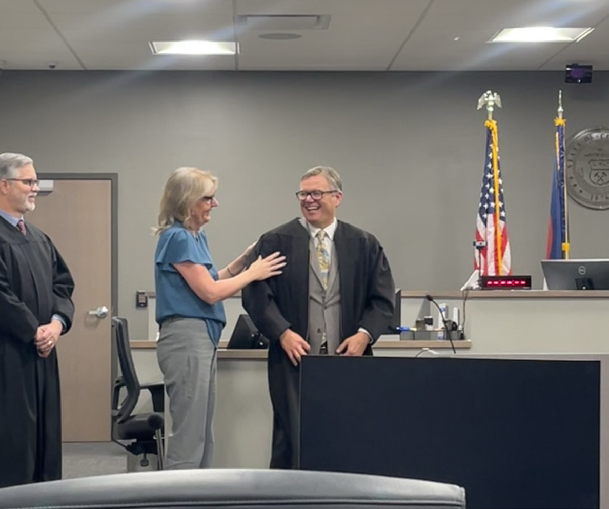 Judge Randy Edwards Jane Edwards adjusts her husband, San Juan County Judge Anthony Edwards ...