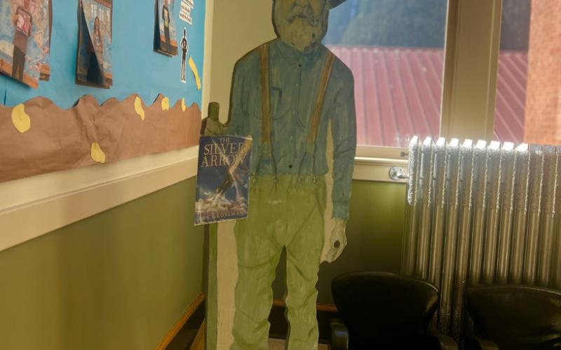 The Miner mascot adorns the stairwell to the Silverton School with Sultan Mountain as the backdrop. The students were sharing their school year portfolios all during this last week with their parents, teachers, and community members. Photo credit DeAnne Gallegos