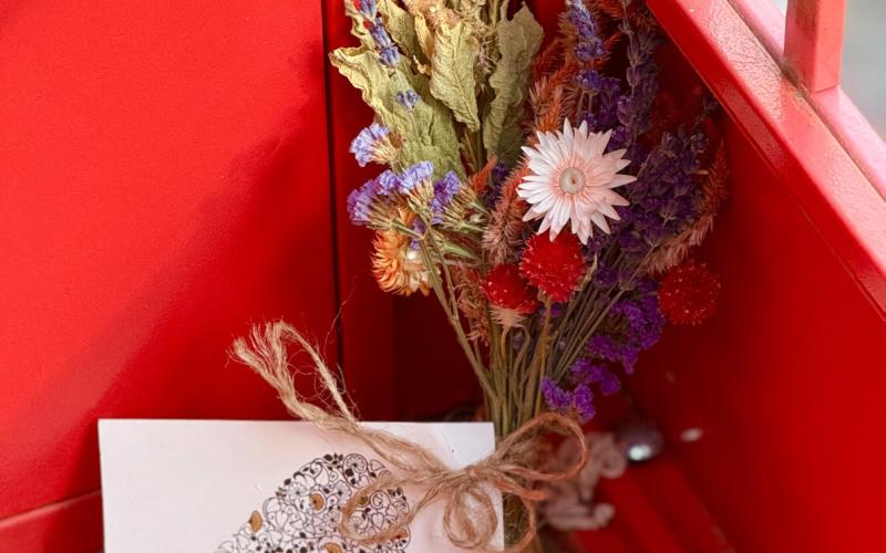 Flowers and notes are left at the Windphone in the Silverton Cemetery not only for Nancy Brockman who passed away a year ago but for visitors loved ones who heard about the Windphone and came to Silverton Cemetery to use it. Photo by DeAnne Gallegos