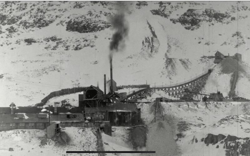 Iowa Mine structures at Silver Lake in 1898, looking toward the west, showing the operation at peak development, including tram station and surface tram trestle. Photo: San Juan County Historical Society