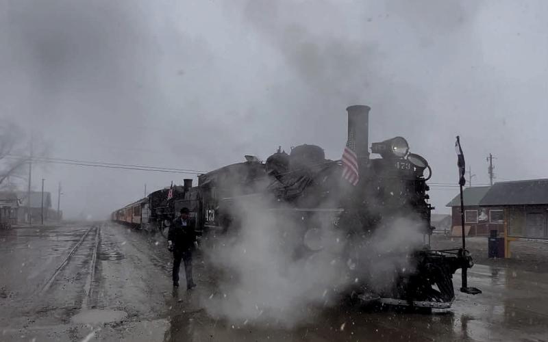 Snowing during the arrival of Saturday’s last rain of the summer season. Photo credit DeAnne Gallegos