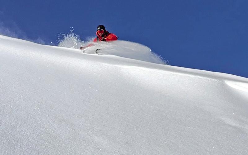 Calvin Davenport skiing early powder at Silverton Mountain Photo credit Marc Kloster