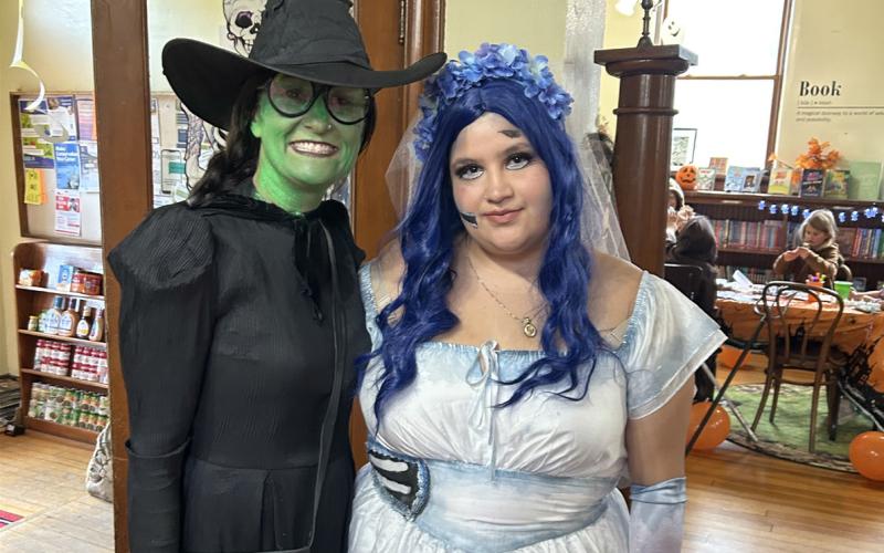 Photo by Misti Anderson Misti Anderson and Madelynn Minjaes at the library’s Halloween party.