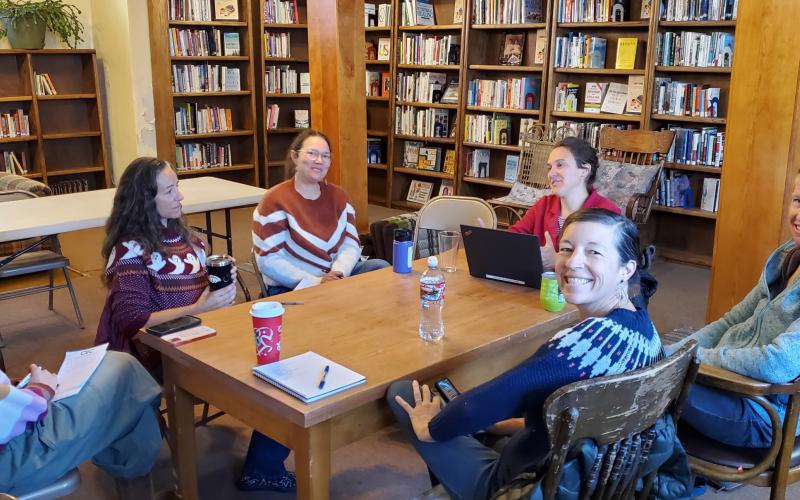 Photo by Jim Harper A group of Silverton leaders meet at the Silverton Public Library to discuss a food collective initiative with the government shutdown affecting 43 families on SNAP in Silverton.
