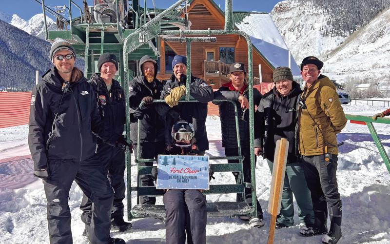 Photo credit DeAnne Gallegos Kendall Mountain Ski Area crew on opening day with First Chair of Winter 2024 season rider Jayden Jones.