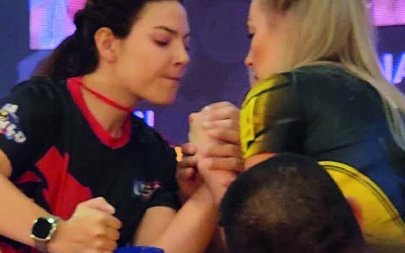 LiErin Wilson is now the reigning 2x WORLD CHAMPION arm wrestler by beating Ukraine’s Elena Kuzmych. Photo credit Ben Bledsoe