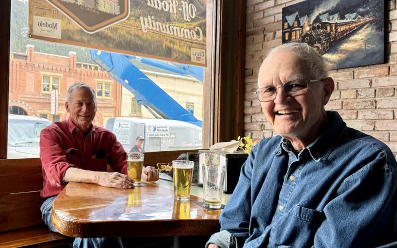 Longtime local Terry Kerwin enjoys happy hour with one of his closest friends, local Ray Dileo, at the Alpine Tavern last week photo by DeAnne Gallegos