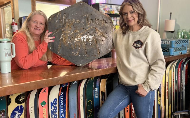 Avalanche Brewery now Alpine Tavern Julie and Shiloh Sams show off new signage