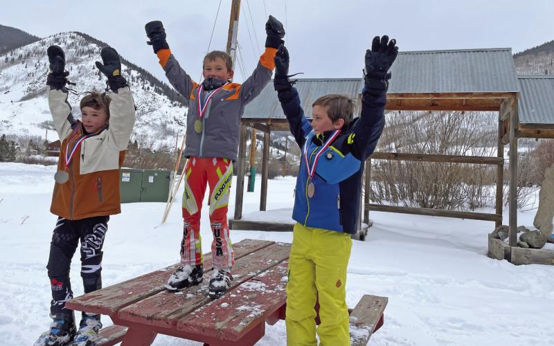 Celebrating their race times. Photo submitted by Sallie Barney
