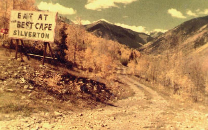 Ernie and Judy Kuhlman dug up this old photo of a billboard advertising the Best Cafe. This was at the Big Bend on U.S. 550. The 2-track road is the road to the Brooklyn Mine. The photo was taken in the fall of 1952. Photo courtesy Ernie and Judy Kuhlman