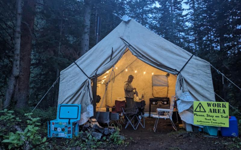 The professional trail builders have to stay out and camp on the project due to the remoteness and access to area. Photo credit Michael Crockett