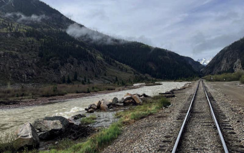 Train tracks leading to summer Photo by Scott Fetchenhier