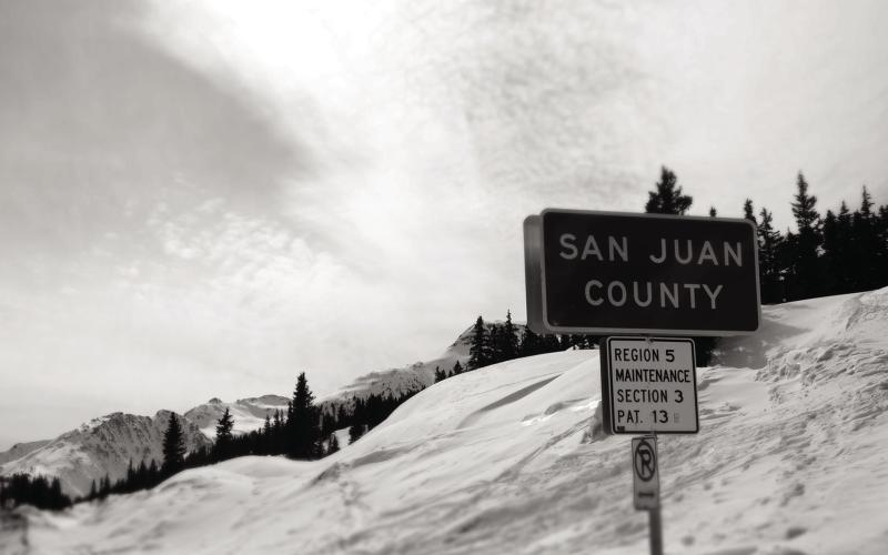 San Juan County sign on the top of Red Mountain Pass. Photo by Adam Andrade