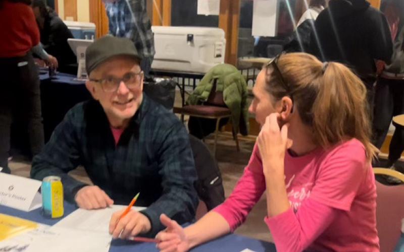 Silverton Creative District Board members Phil Antonelli and Laurel Foster take tickets at the front door of Mountainfilm on Tour. Photo credit DeAnne Gallegos