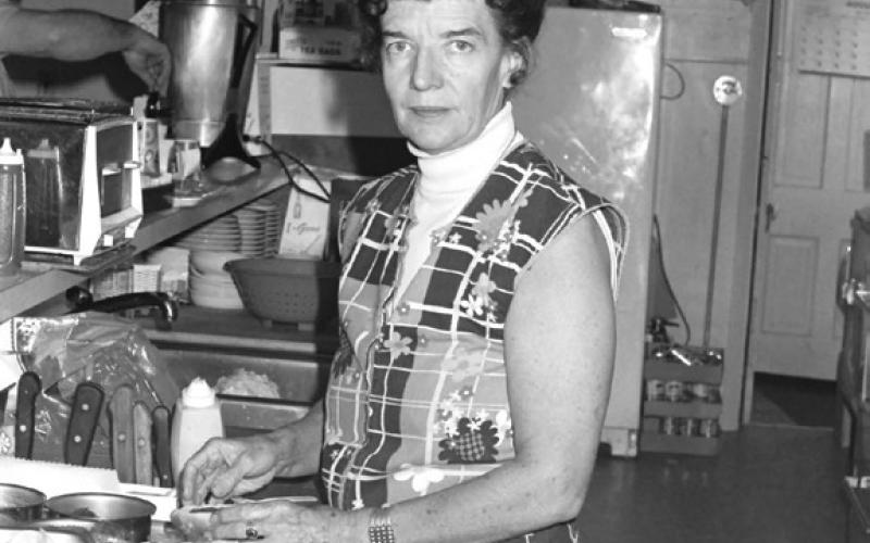 This photo of Catherine Lichliter in the kitchen of the Silverton Drive-In 1963 is on the wall of the Dera Deli paying omage to her