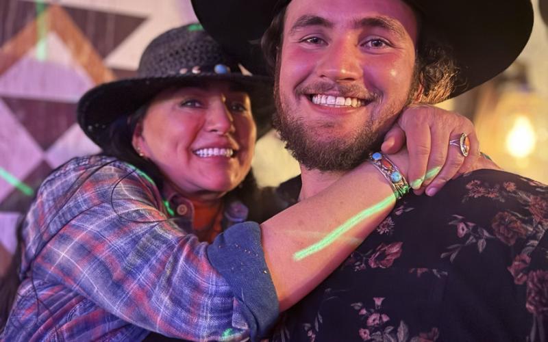 photo by DeAnne Gallegos Bent Elbow owner Angelina Noble and her nephew El Bandito co-owner Mario Letayf enjoy the evening at the fundraiser together.