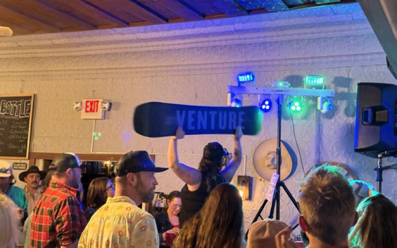 photo by DeAnne Gallegos One of the top raffle items given away at the Ride for Gerardo fundraiser was a Venture Snowboard.
