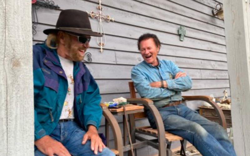 Frank Lee and Mike Geryak hanging out on the porch. These two were close friends and spent lots of time together Photo by Les Clements