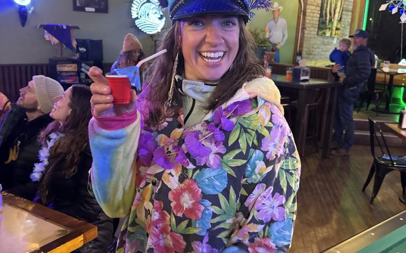 Holly Huebner dresses up the Friday Night Cocktail Crawl during Snowscape photo by Sarah Moore
