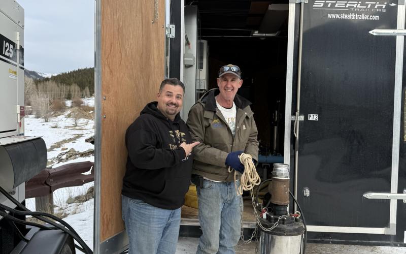 Jim Harper & John Zarkis celebrate the pumps working photo by DeAnne Gallegos
