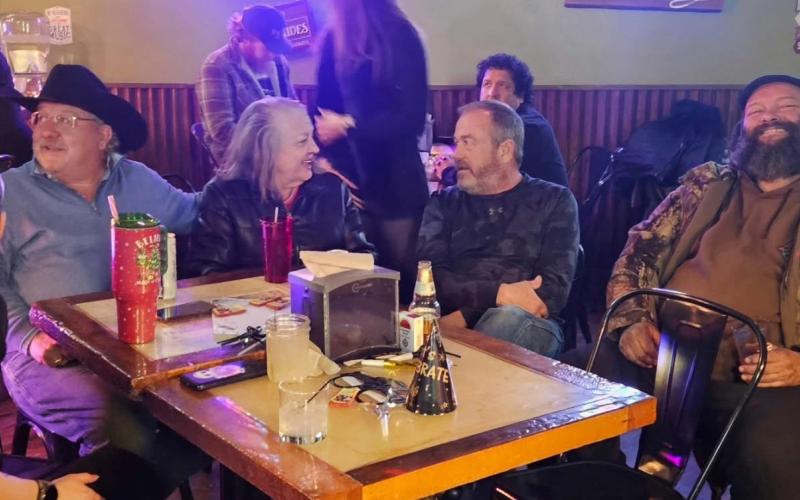 Lots of smiles for the New Year's Eve party photo by Alpine Tavern