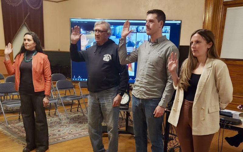 Carl Schnitker second from right during his swearing in as a trustee on April 9th 2024