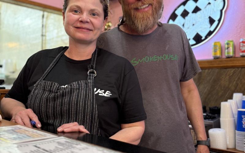 photo by DeAnne Gallegos Sherie and Chris Martin of T’s Smokehouse were happy to be open for the summer