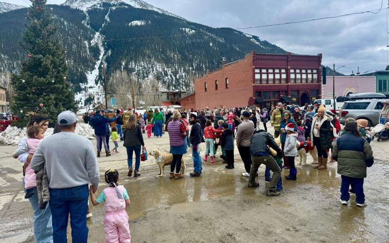 photo by Katey Fetch The line for Santa was long, but the snow was missing this year