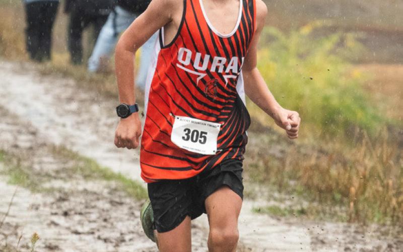 Silverton School’s Bradford Brosh finishes the cross country race last weekend in the rain. Photo by Dave Emory