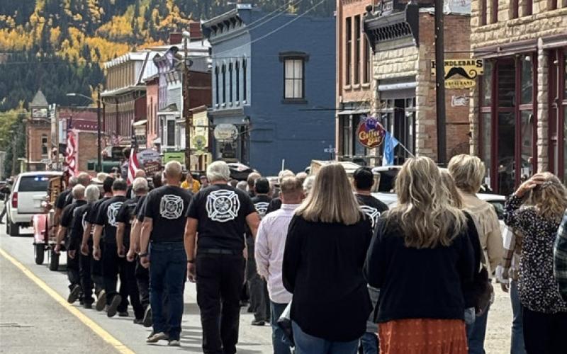 The funeral procession went down the heart of downtown Silverton. photo by Barbara McLachlan