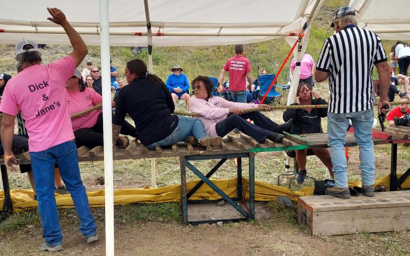 Photo by Hardrockers Judy Kuhlman pulls for Dick &amp; Janes tug a war team at this years’ Hardrockers Holidays.