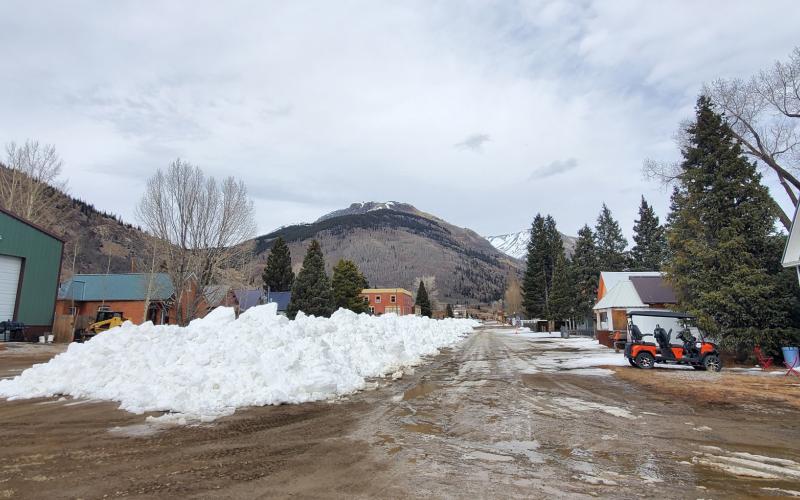 Public works crew started moving snow made over at Kendall down Blair Street to start constructing Skijoring Race Course photo by Jim Harper