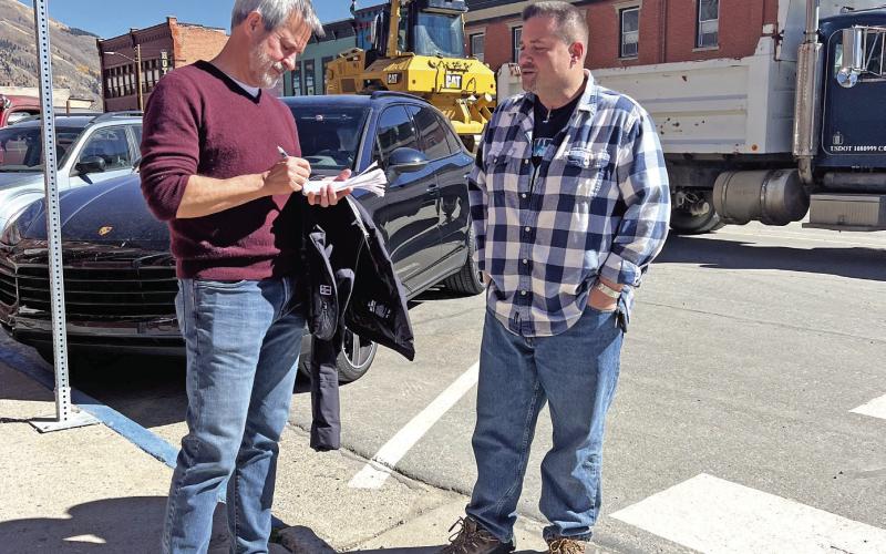 Jonathan Weisman from the New York Times interviews Silverton local Jim Harper. Photo credit DeAnne Gallegos