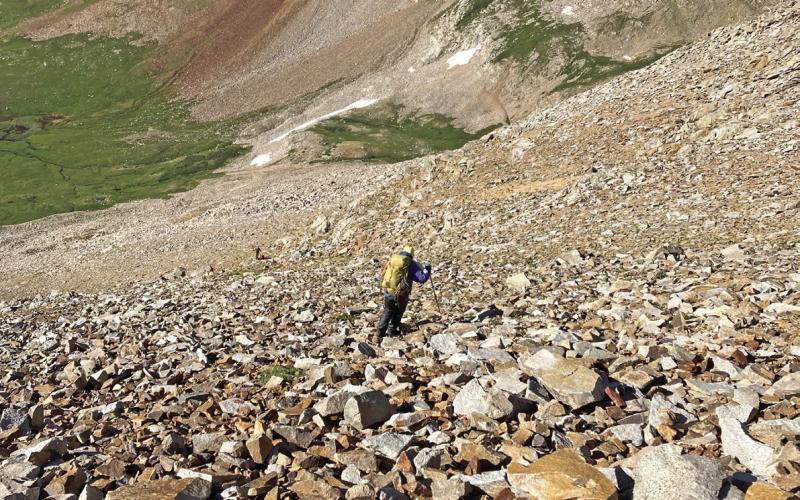 The rescue team traversing through rugged terrain Photo credit Silverton Medical Rescue