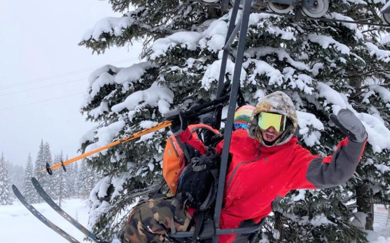 Skiers on the lift at Silverton Mountain ready to feed that powder addiction. Photo Credit Silverton Standard