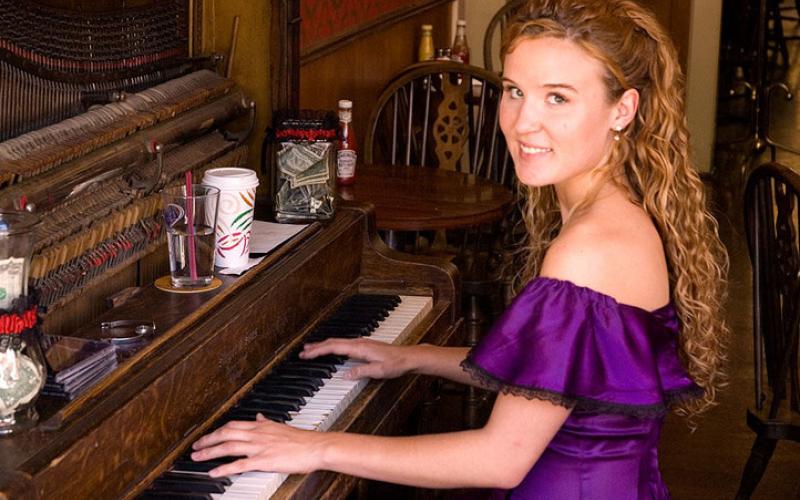 Lacey Black has played piano at the Saloon since 2000 and is now the owner. Photo by Lacey Rose Saloon