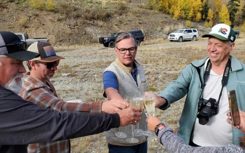 Champagne cheers over the land the County gained from Sunnyside Gold (L-R)- SJC Commissioners Pete Maisel, Chairman Austin Lashley, Anthony Edwards, SJC Administrator Willy Tookey, SJC PIO DeAnne Gallegos. Photo credit Jim Harper