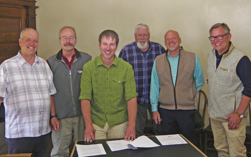 SJC Commissioners, Staff and Legal representatives finalizing the Sunnyside Gold Land Transfer! Photo credit Klemmens Branner