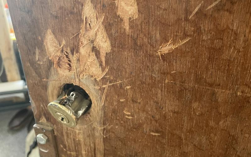 Axe damaged lock on door of art gallery. Photo credit Ian Tanner