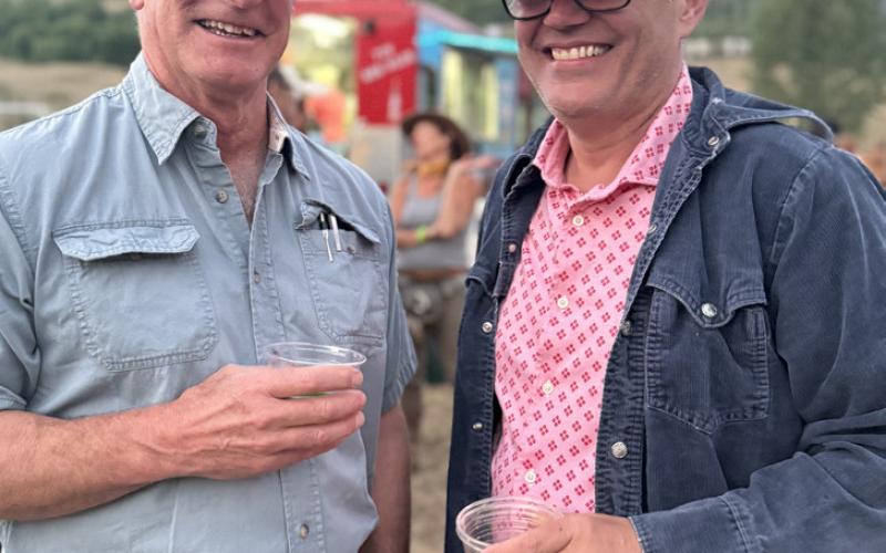 Ken Bellewag &amp; Anthony Edwards enjoy the summer evening in Memorial Park last Friday. Photo by DeAnne Gallegos