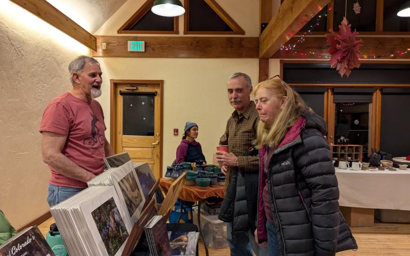 Wesley Berg photography booth from 2024 Mistletoe Market Photo by SCD