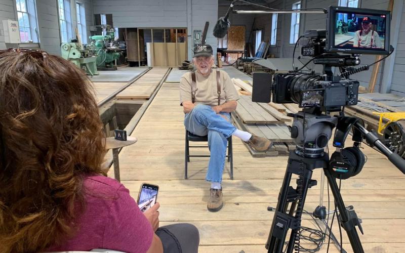 DeAnne Gallegos interviews long-time local Jerry Hoffer in the Silverton Northern Engine House for the Town of Silverton’s 150th short film. Photo credit David Dibble