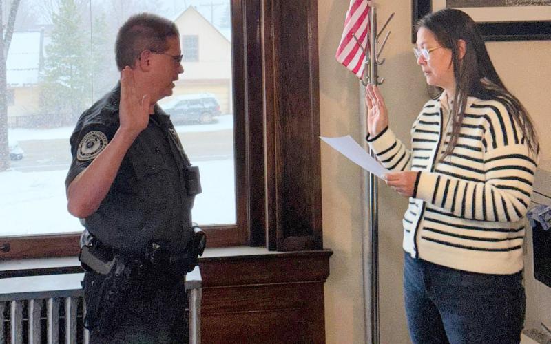 San Juan County Sheriff Steve Lowrance being sworn in by San Juan County Judge Kelly Tompkins photo by Alex Lanis