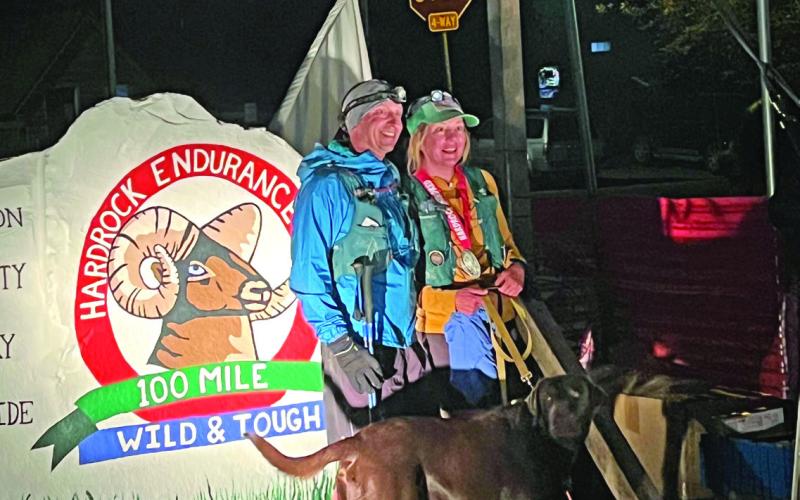 Finisher and Silverton local Amanda Grimes, her husband Billy, and their dog Taj. Photo Credit Deanne Gallegos