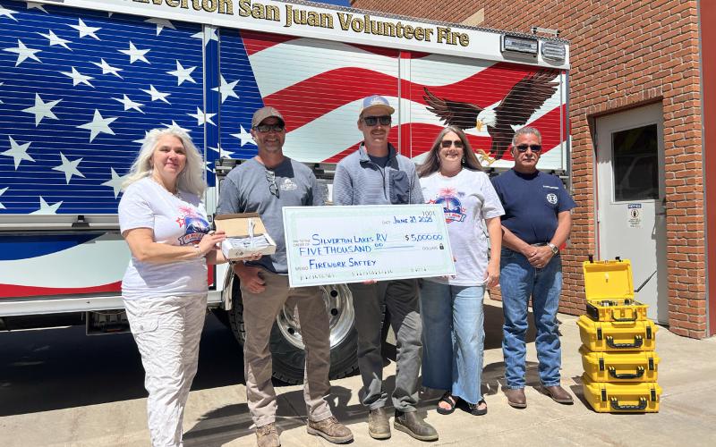 Silverton Lakes RV Park donated $5,000 to the 4th of July Association towards the fireworks show and safety gear. Left to right: Molly Barela, Jamie Stevens, Gaige Heinbaugh, Melanie Barger, and Chief Archuleta. Photo credit DeAnne Gallegos