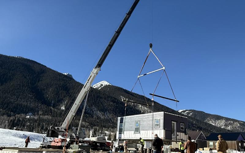 Fading West drops the first housing unit in place on Tuesday Photo by DeAnne Gallegos