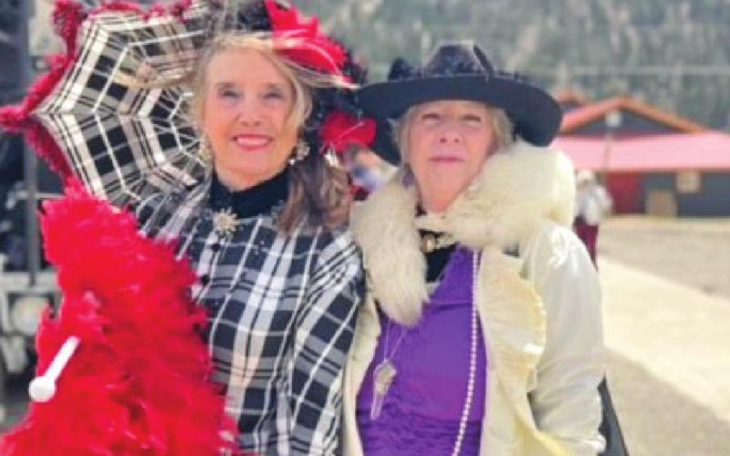 Photos by the Silverton Area Chamber of Commerce Carolyn Wilcox and Judy Graham greet the train in Victorian Garb