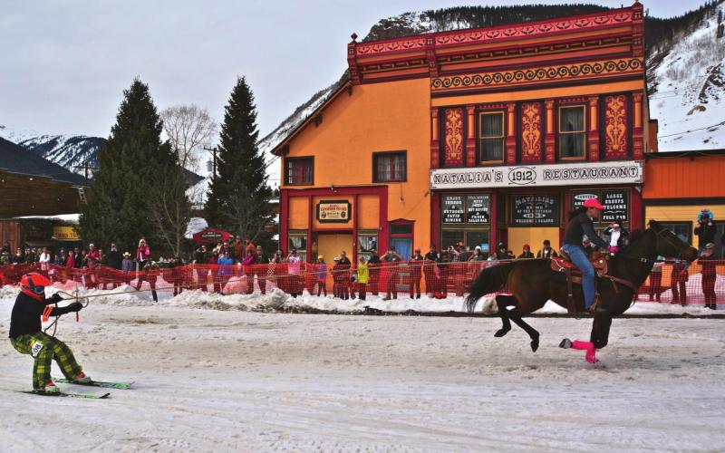 Skiers are evaluated by time and how well the skier navigate the jumps and gates and collect the rings. It’s a popular event so aspiring spectators should make their travel plans soon! Photo Credit Silverton Skijoring