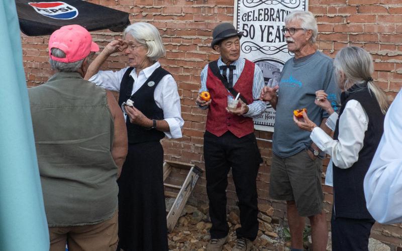 Judy Zimmerman, Loren Lew, Charlie and Paulette Schmalz enjoyed catching up at the Silverton Brass Bands concert on Sunday photo by Ray Dielo