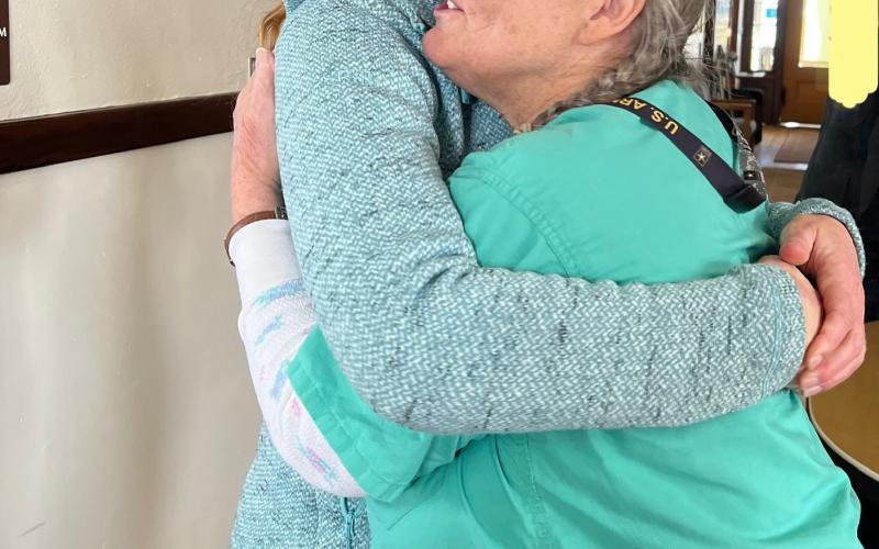 The Public Health Director, Becky Joyce, gives NP Agnes a goodbye hug on Thursday, January 30th, at the Silverton Clinic. vPhoto credit DeAnne Gallegos